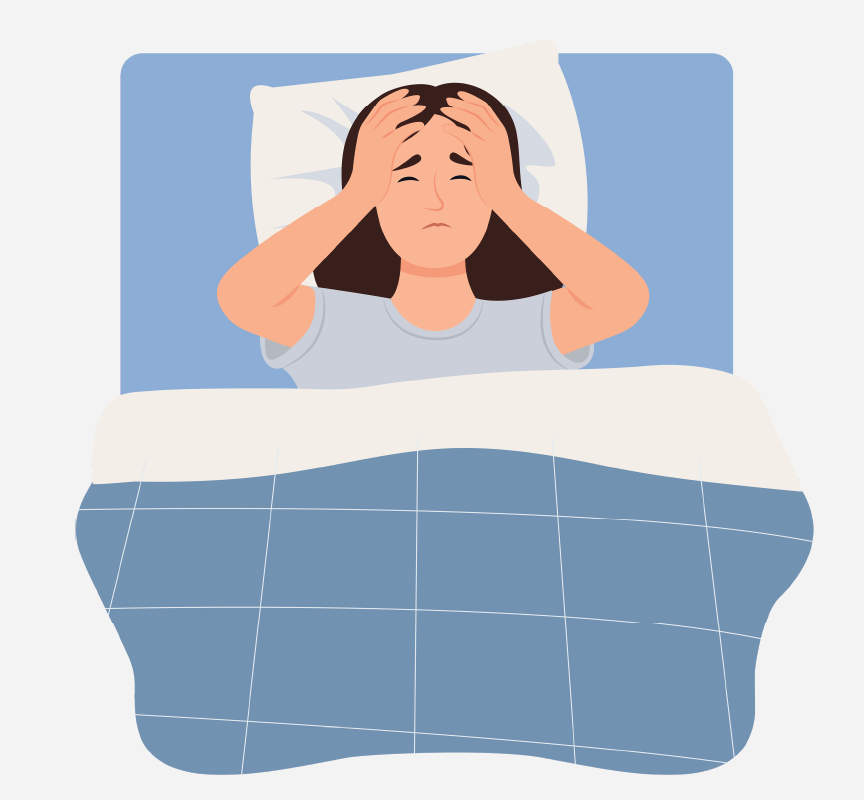 A sick woman lying in bed