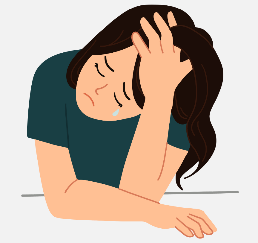 A sad woman with her head in her hand.