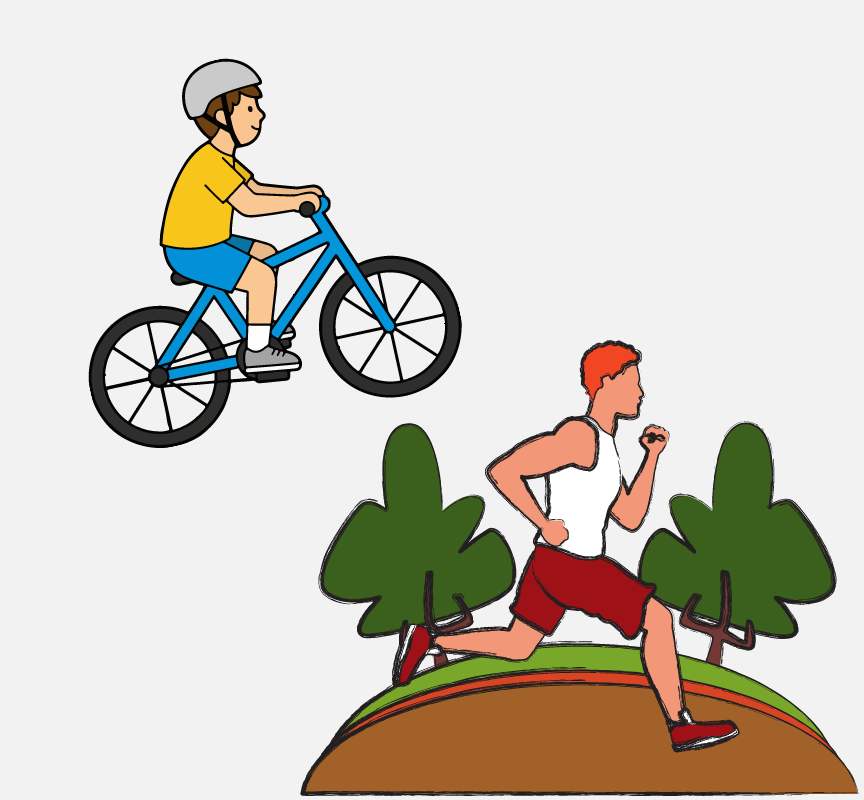 A boy riding a bike and another boy running on a hill.