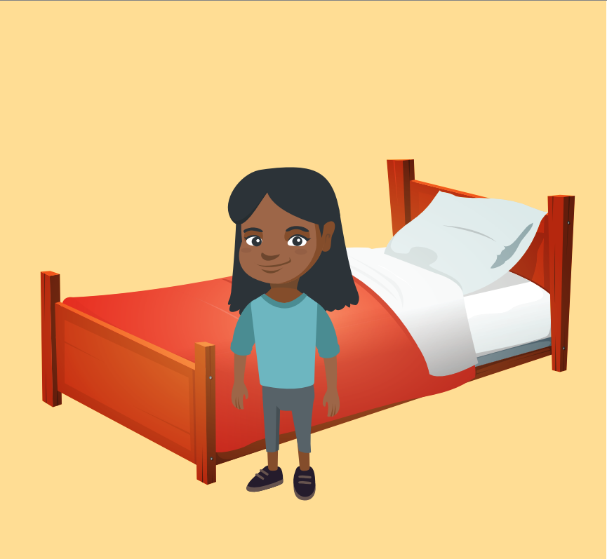 A smiling young girl stands in front of a bed.