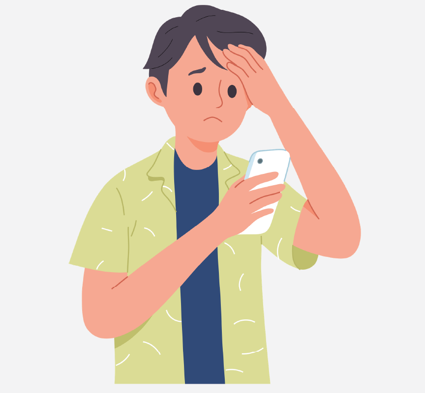 A worried-looking boy using a cell phone.