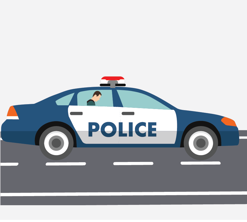 A man sitting in the back of a police car
