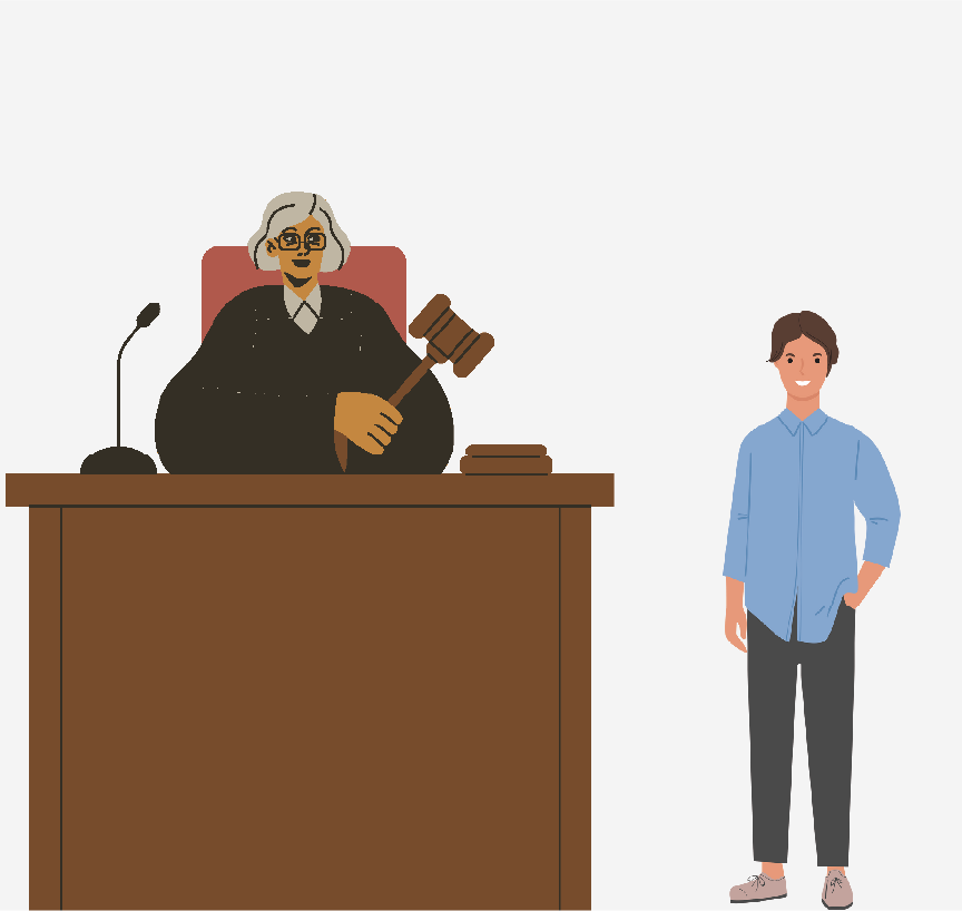 A man standing next to a judge sitting at the bench and holding a gavel.