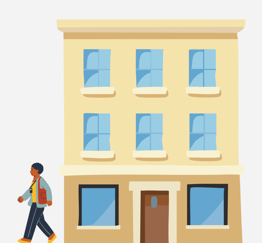 Image of a building with a person walking away from it.