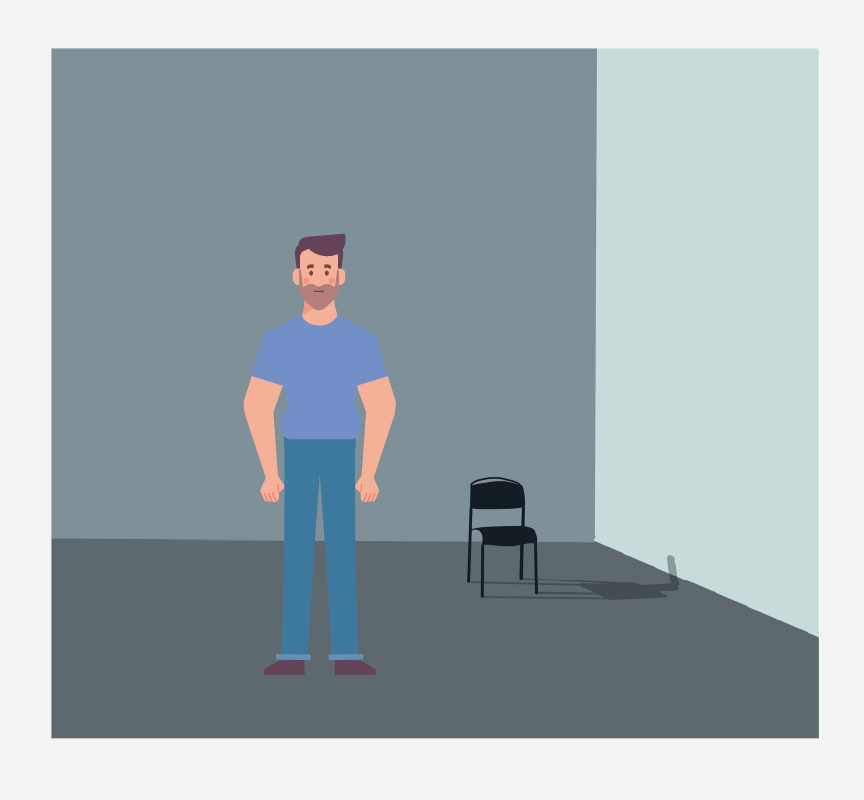 A man standing alone in a quiet room