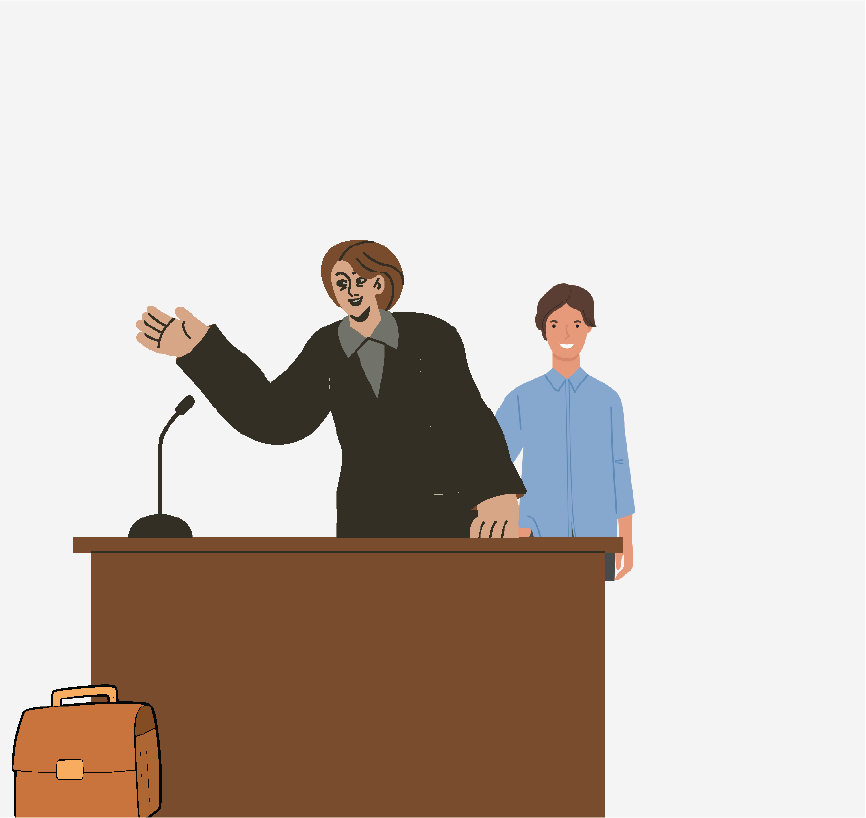 A man and attorney sitting at a table. There is a brief case in front of it.