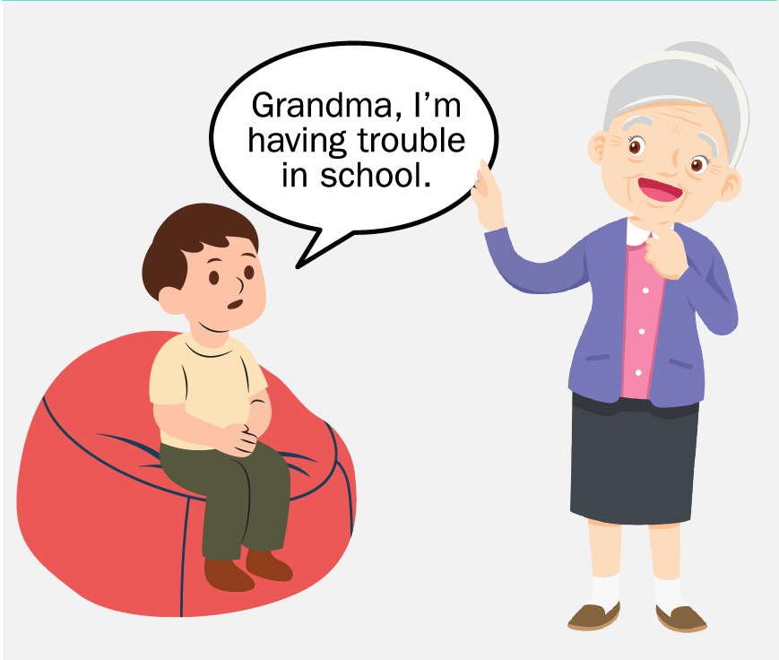 A young boy telling his grandma that he’s having trouble in school.