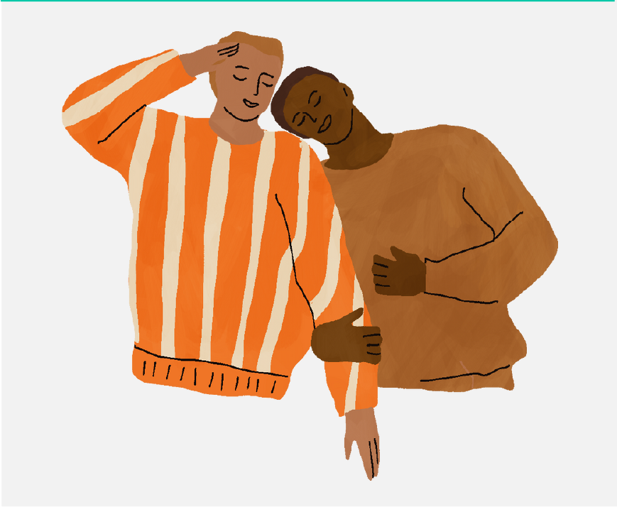 A man holding another man’s arm with his head on his shoulder.