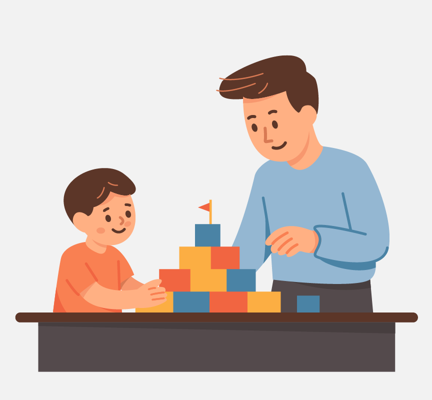 A man and boy using blocks to build a tower.