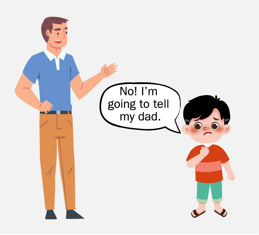 A man standing next to a young, scared boy who is saying 