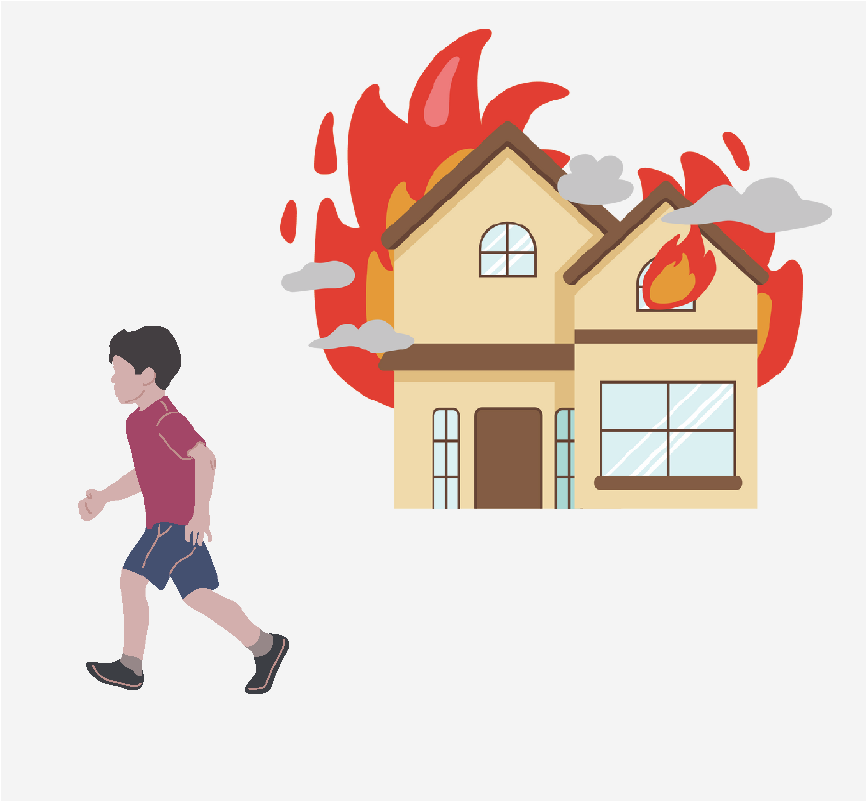 A boy running away from a house on fire.