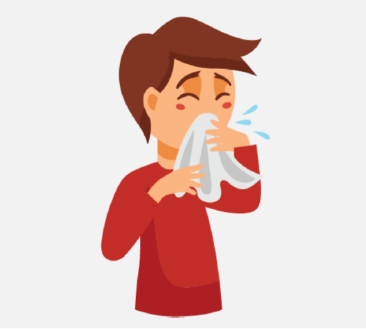 A sick boy coughing into a tissue.