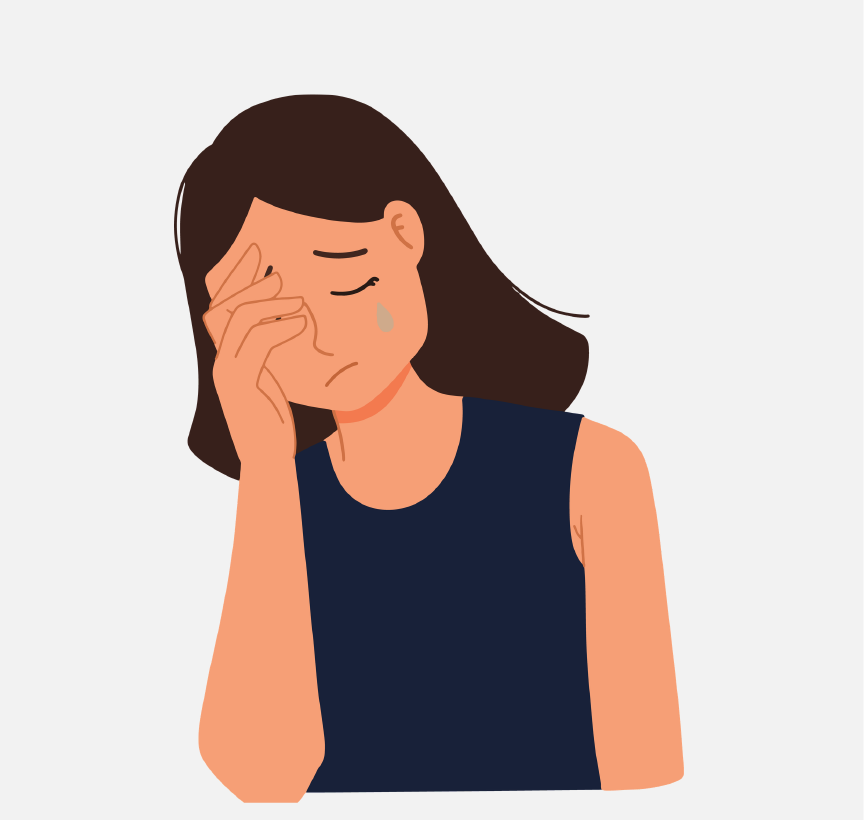 A sad woman with her face in her hand.