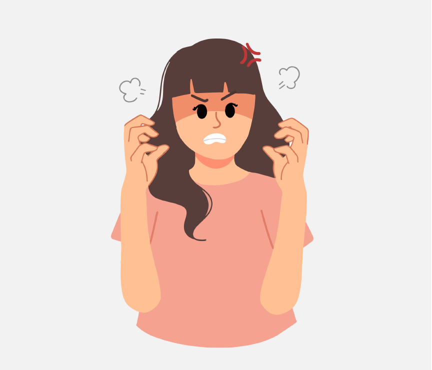 An angry woman with her hands by her face.