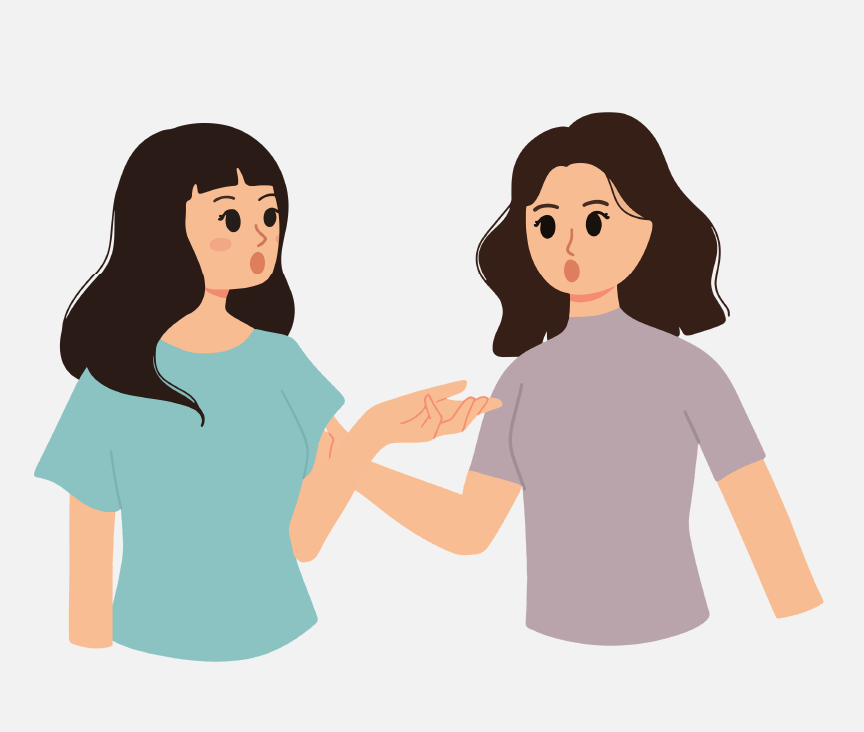 Two women talking to each other.