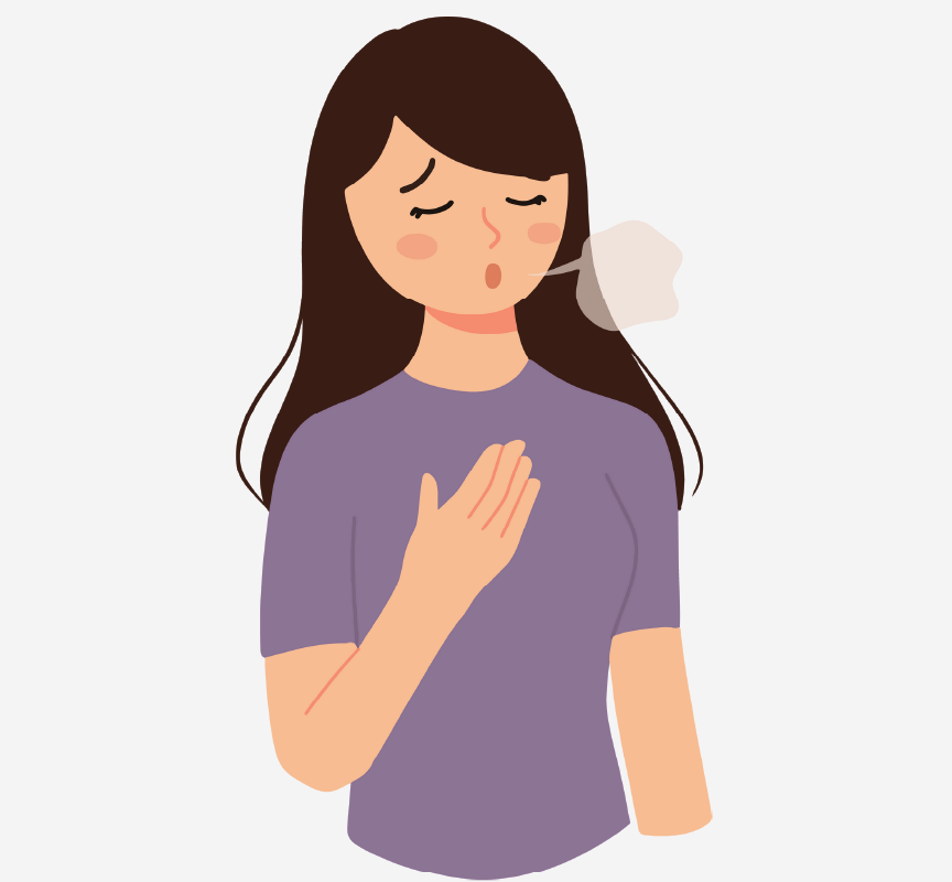 A girl taking a deep breath.