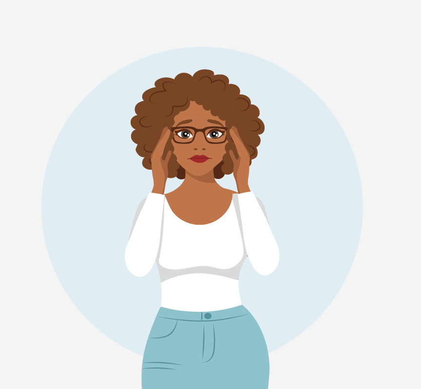 A woman touching her head with her hands.