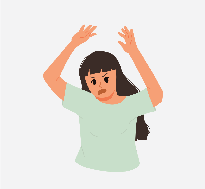 An angry girl with her hands above her head.