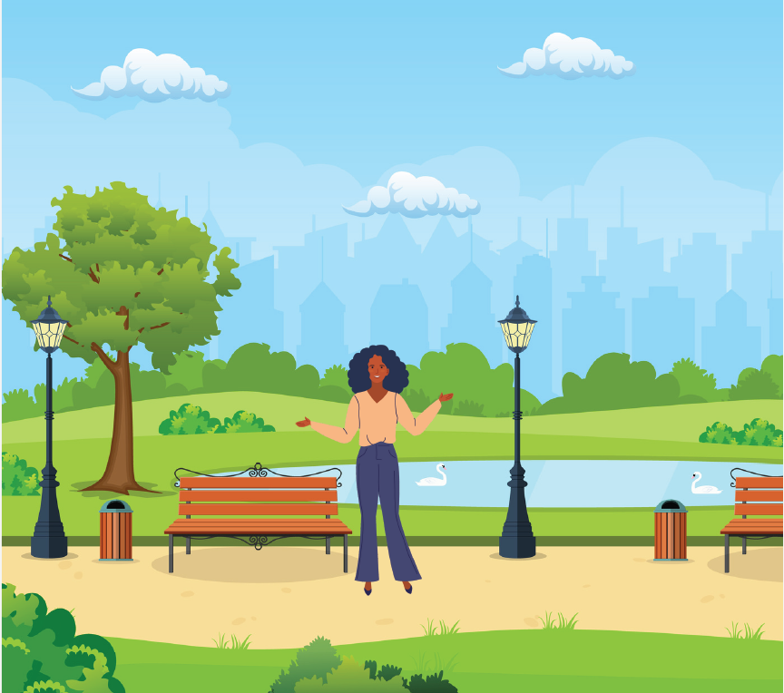 A woman standing in a park.