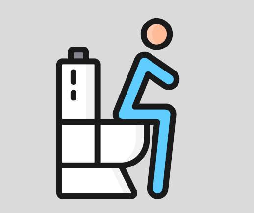 A man sitting on the toilet.