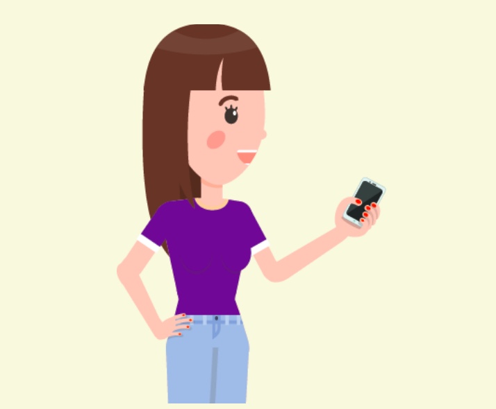A woman standing with a cell phone in her hand.