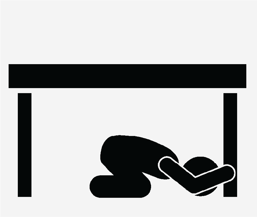 A figure hiding underneath a table.