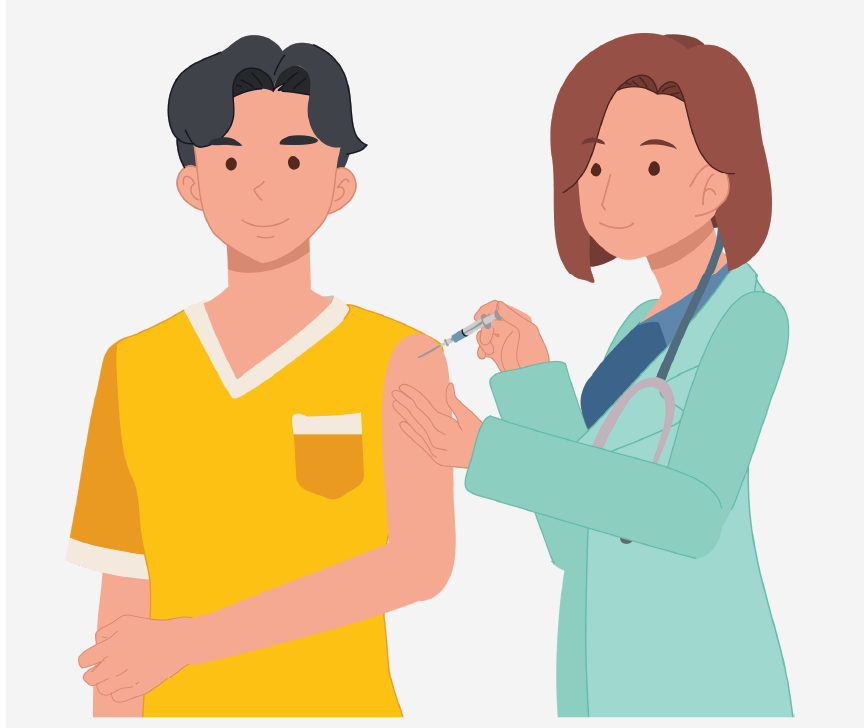 A boy getting a vaccination from a female healthcare worker.