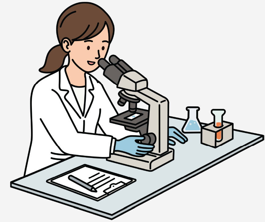 A female scientist looking into a microscope.