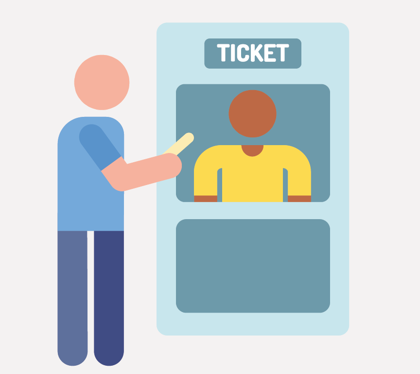 A person buying a ticket at a ticket booth.
