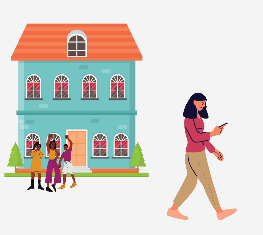 Woman walking outside looking at phone.