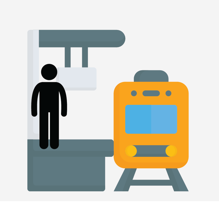 A person standing on a subway platform.