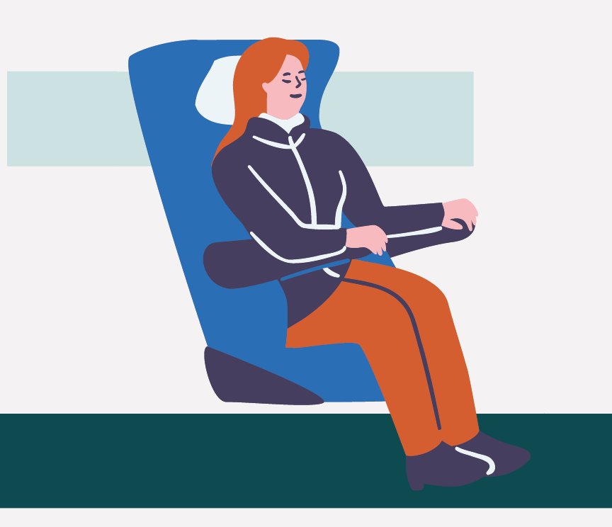 A person sitting in a train seat.