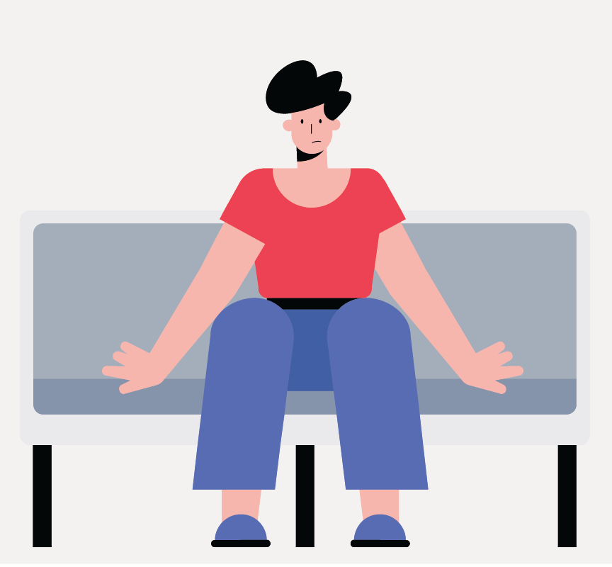 A person sitting alone on a bus seat.