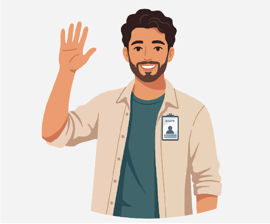 A man smiling and waving his hand. He is wearing a name tag.