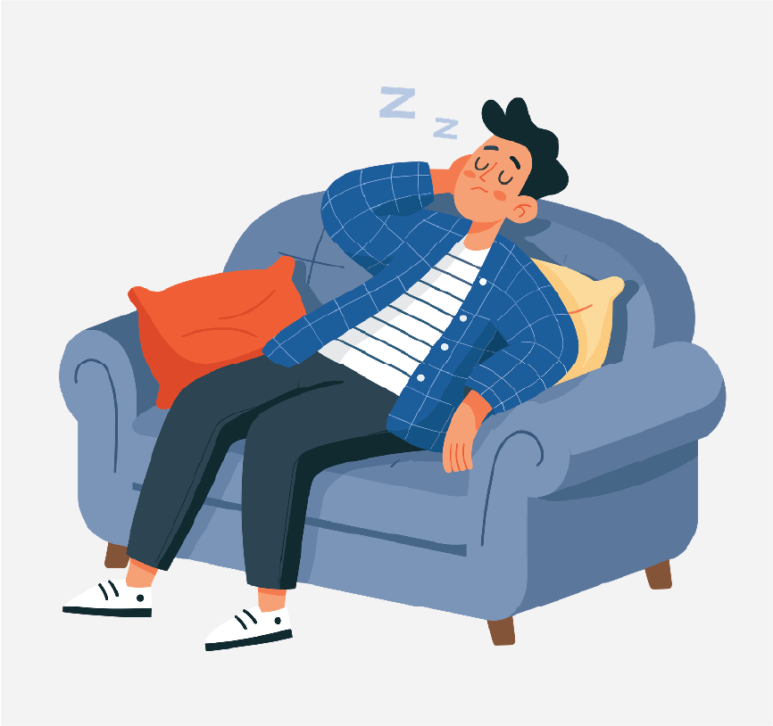 A young man sleeping in a comfy chair.